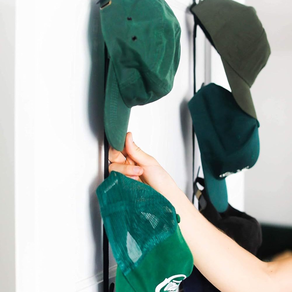 Bastidores de gorra de béisbol simple ahorro de espacio plegable puerta colgante armario transfronterizo gorra de béisbol de almacenamiento ajustable