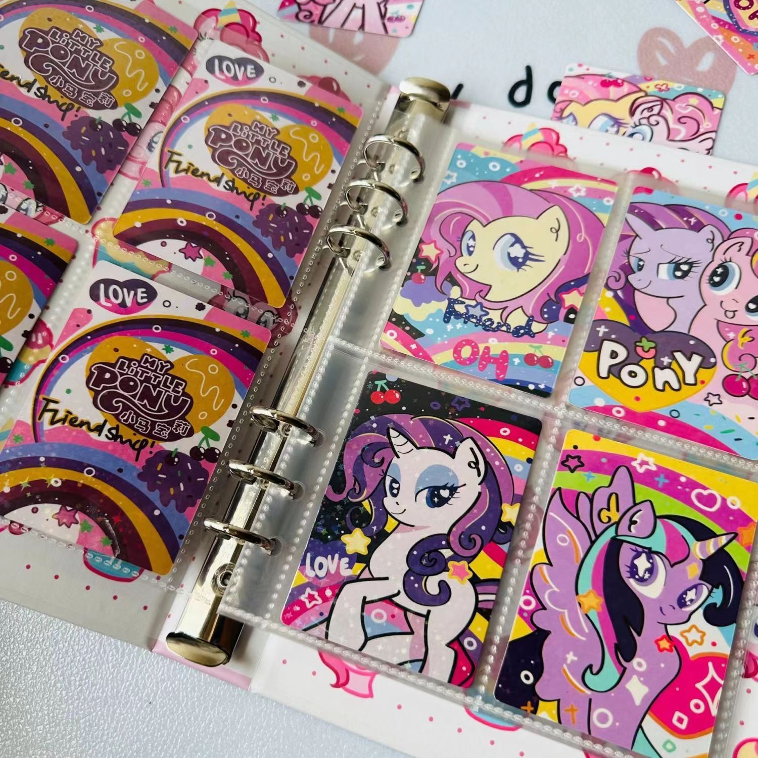 Xiaohongshu mismo estilo Xiaoma Baoli A5 libro de tarjetas de hojas sueltas estudiante cuatro cuadrículas superduras shell persiguiendo estrellas libro de tarjetas de almacenamiento