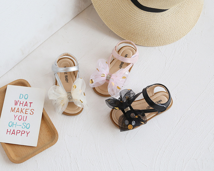 Versione coreana di fiori dolci da bambina con grande fiocco, scarpe per bambini, sandali per le vacanze al mare, estate 2021_voghion.com
