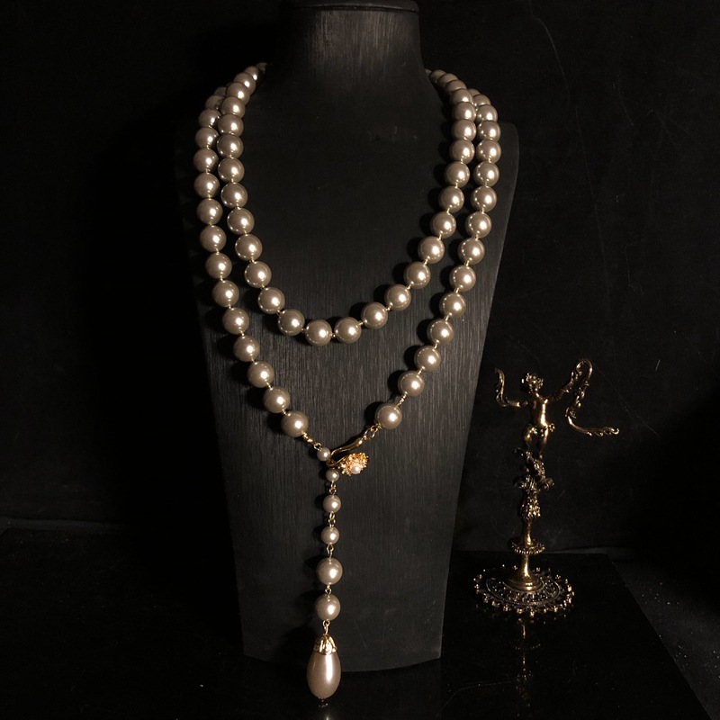 Collana lunga vintage stile western con perla barocca e vetro_voghion.com