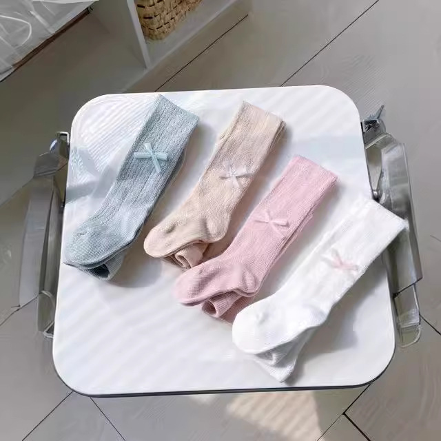 24 spring and summer new Spanish style moving ring hollow pantyhose combed cotton big bow female children Princess socks