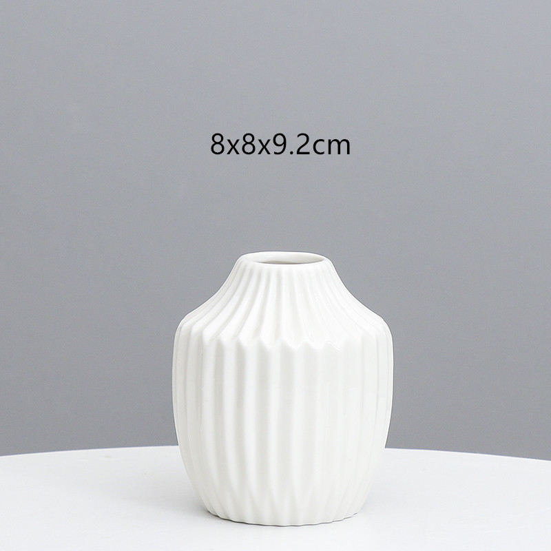 Florero de cerámica al por mayor creativo ins hogar estilo europeo del Norte simple rayado creativo Luz de lujo decoración de arte al por mayor