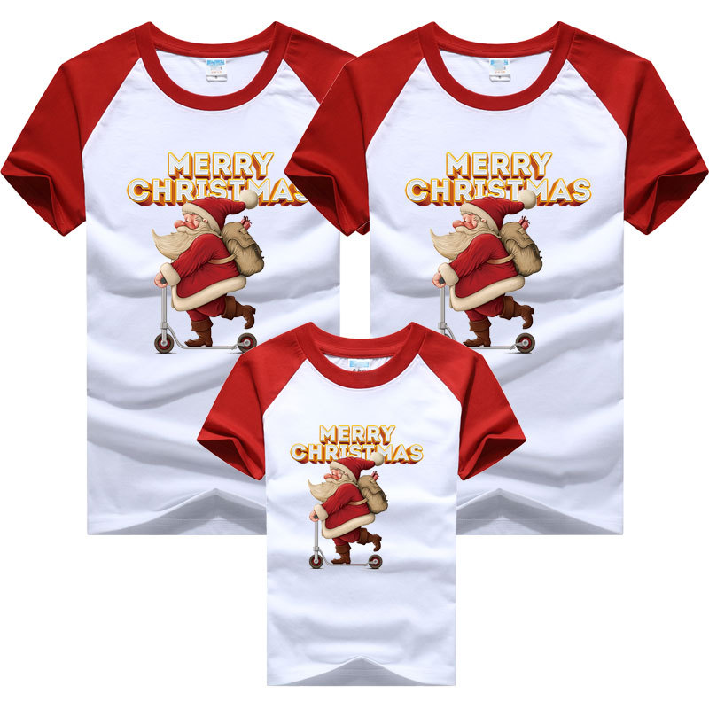 Traje padre-hijo una manga raglán de cuatro bocas verano levante la mano Navidad patineta Santa Claus niños manga corta color a juego transfronterizo camiseta
