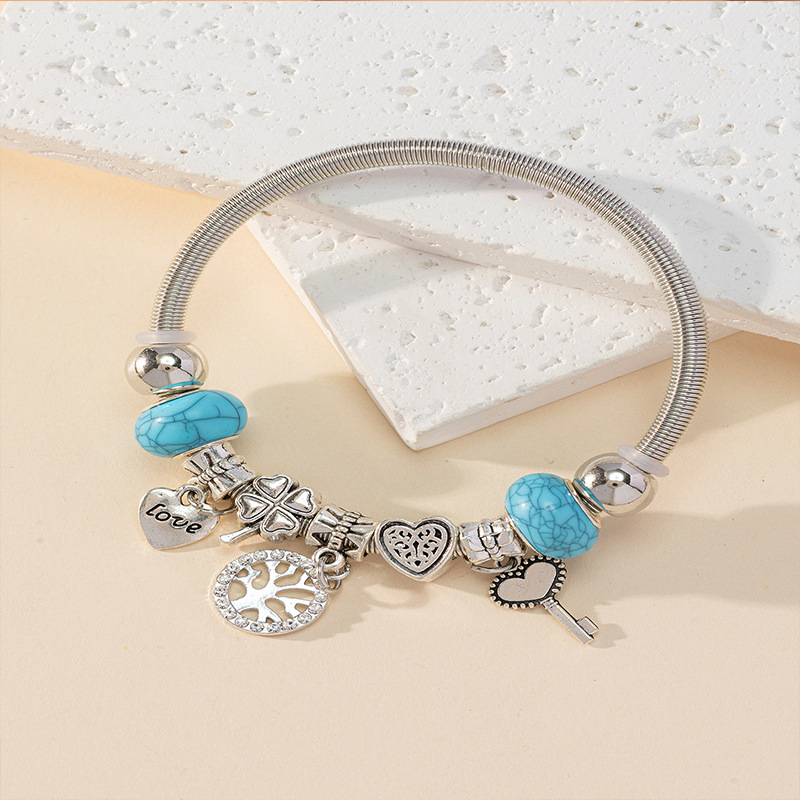 Panjia pulsera Dora DIY cuentas transfronterizas explosión amor accesorios de cuatro hojas llave de la vida árbol colgante pulsera