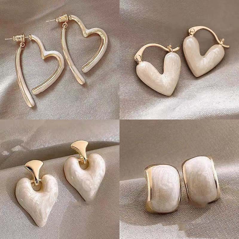 Aguja de plata flor pendientes geométricos pendientes dulces pequeños frescos de Corea del Sur ins moda nicho pendientes