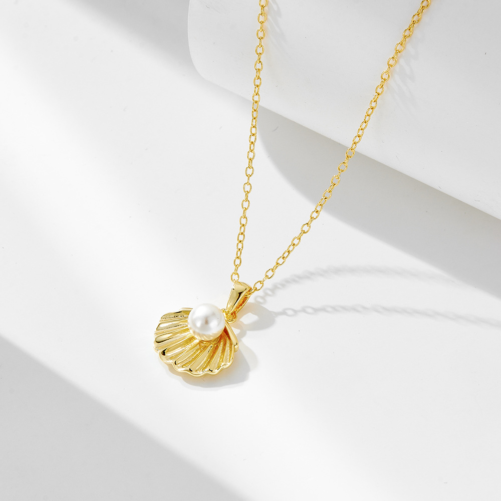 S925 plata de ley chapada en oro de 14K collar de concha de perla de oro temperamento elegante femenino europeo y americano ins diseño de nicho sentido cadena de clavícula