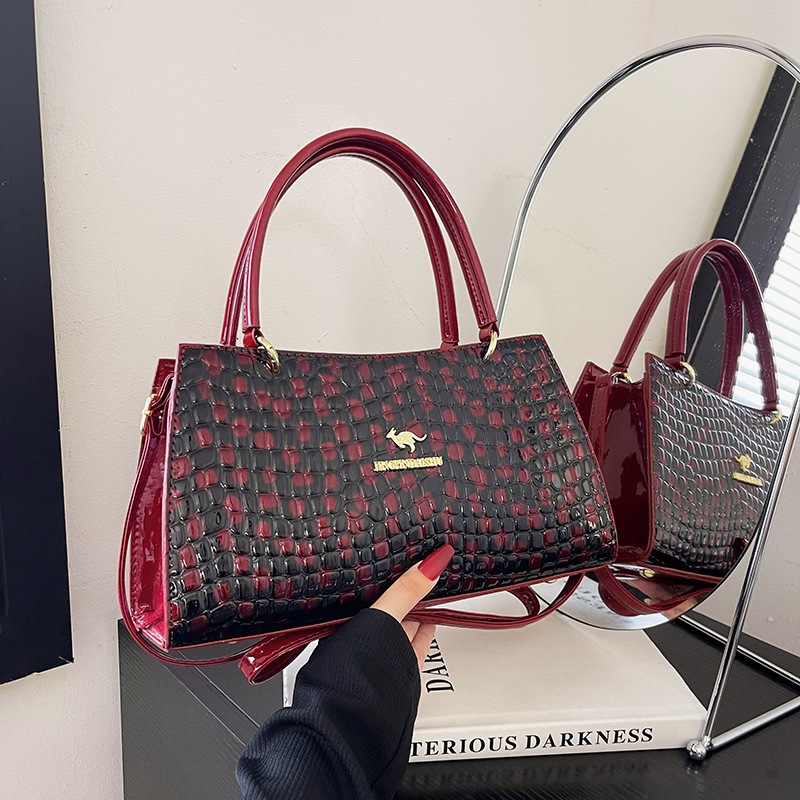 Bolso de gran capacidad 2023 nuevo bolso de mensajero de un solo hombro de moda bolso de patrón de piedra de superficie brillante simple bolso de textura