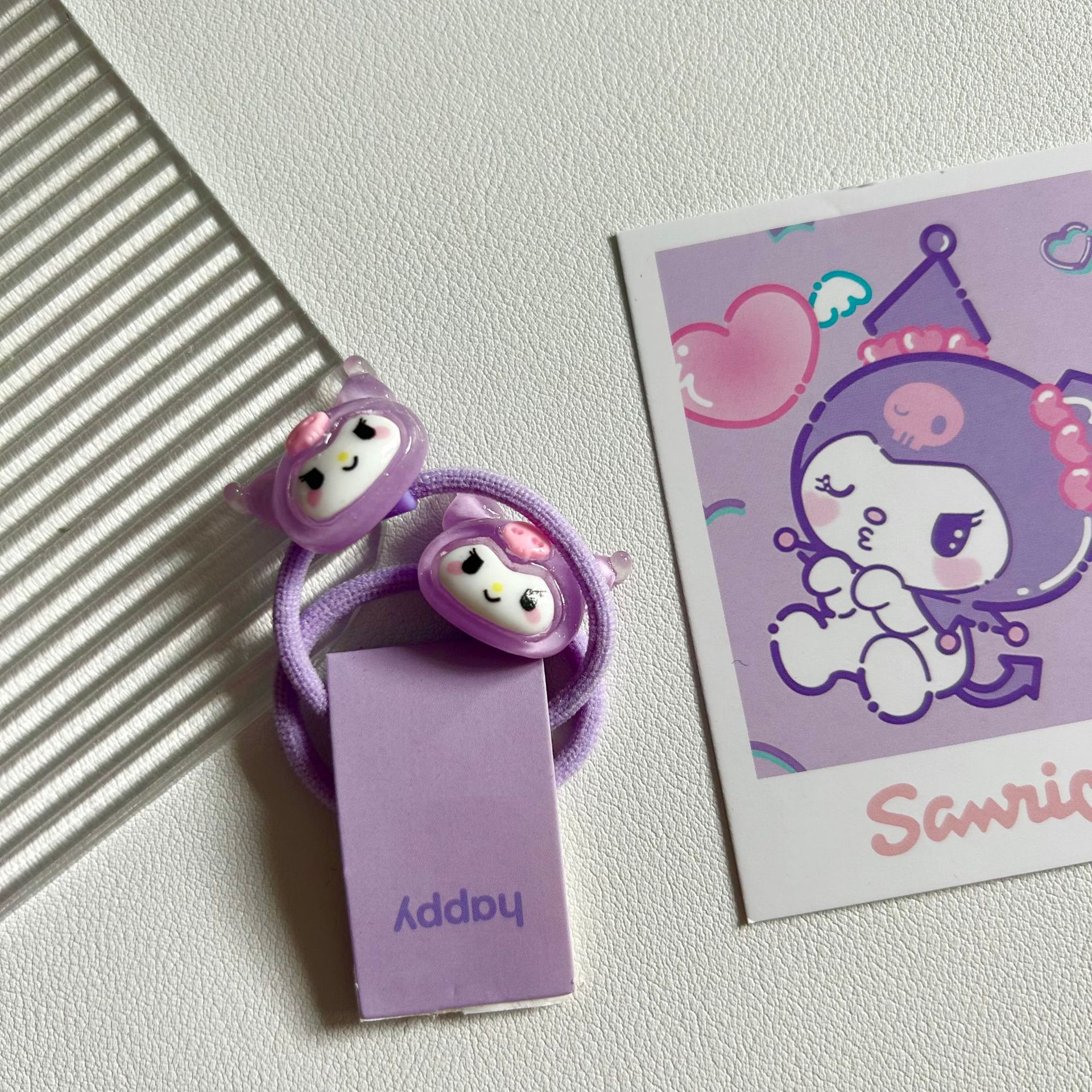 1 pequeña biblioteca morada (con tarjeta de imagen)