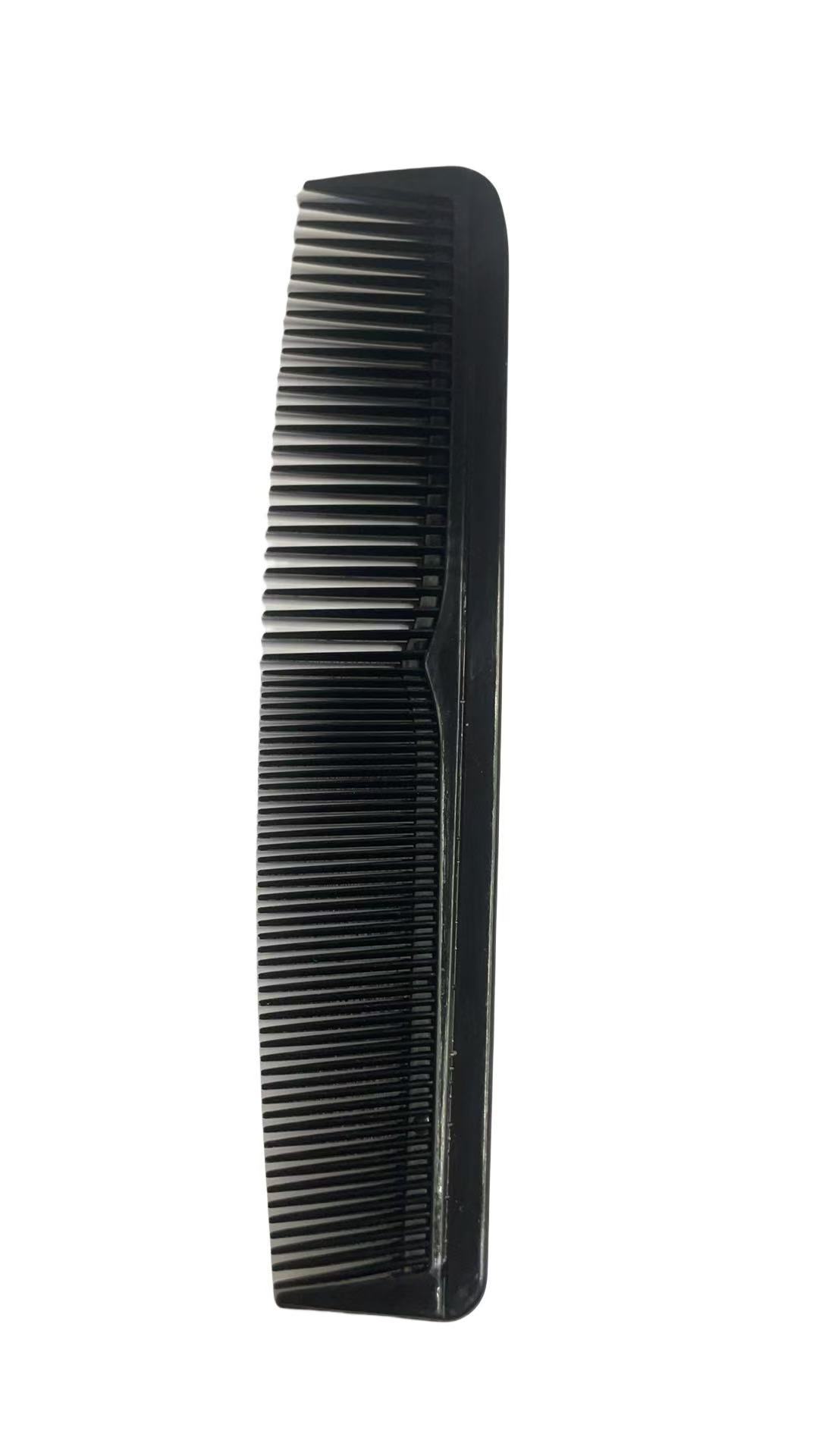 черный гребешок в форме полумесяца