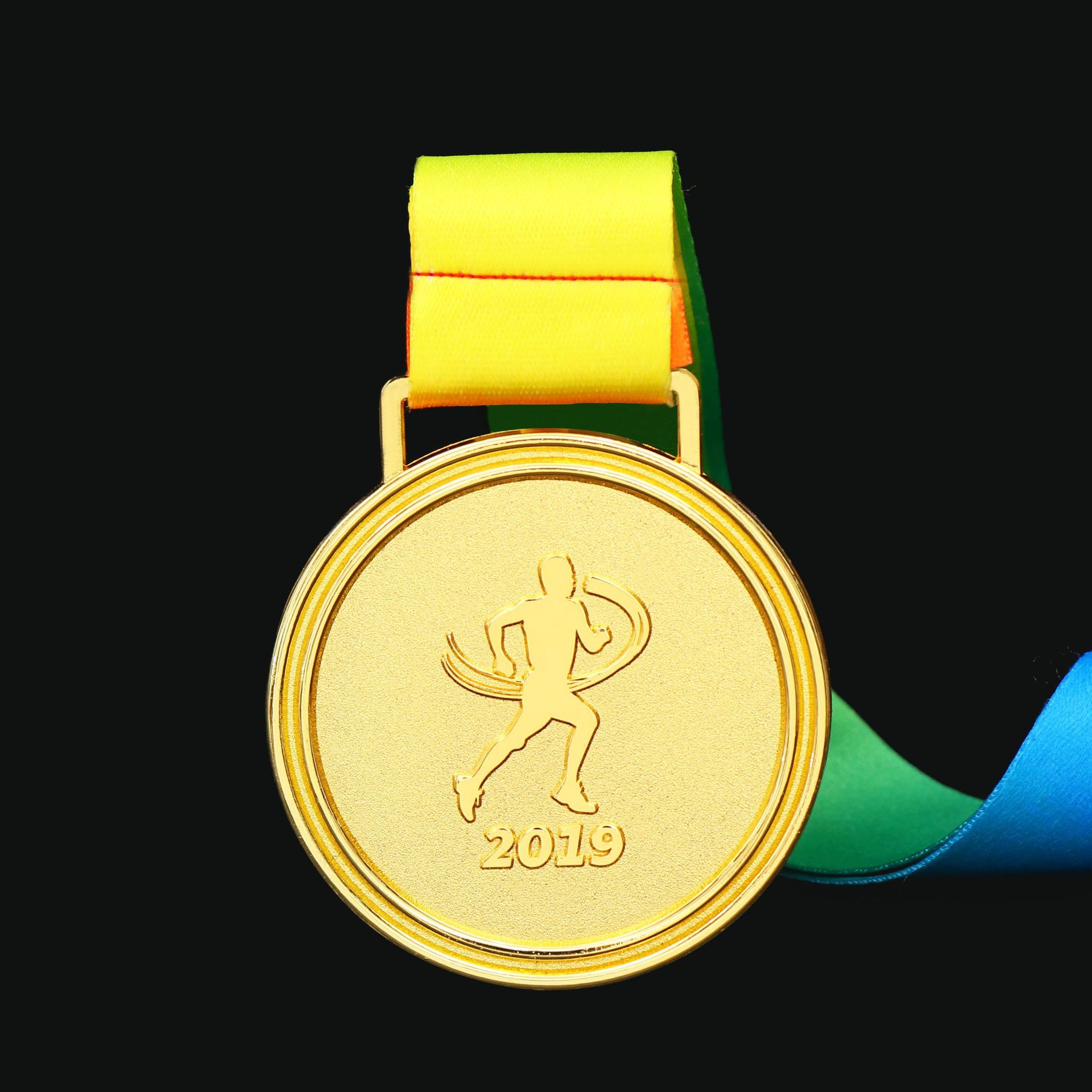 Fábrica en stock creativo de aleación de zinc en blanco medalla conmemorativa personalizada medalla de metal de deportes escolares
