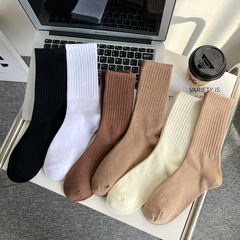 Socks women's mid-calf socks ins trend versatile black and white Japanese high-waisted solid color mid-calf socks women's pile socks