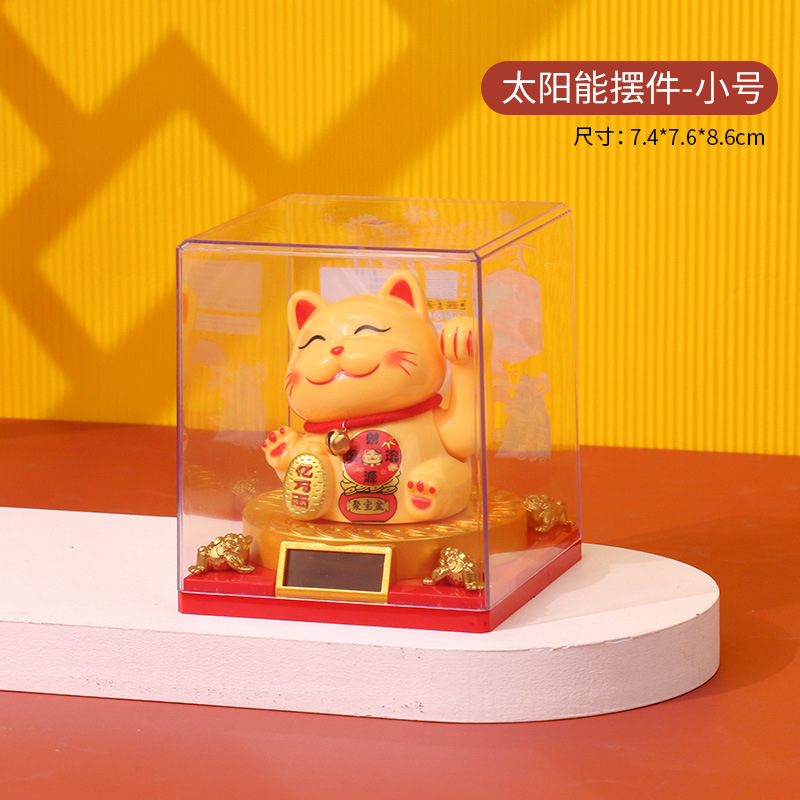 335新型の小さいサイズの太陽エネルギーは手を振って猫のケーキを招きます。|undefined
