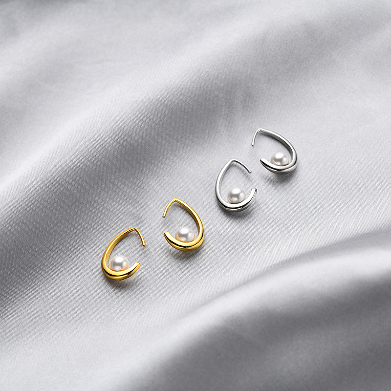 Coreano 925 plata esterlina perla hueco gancho de orejas simple nicho de moda de alta calidad goteo pendientes de perlas de mujer pendientes