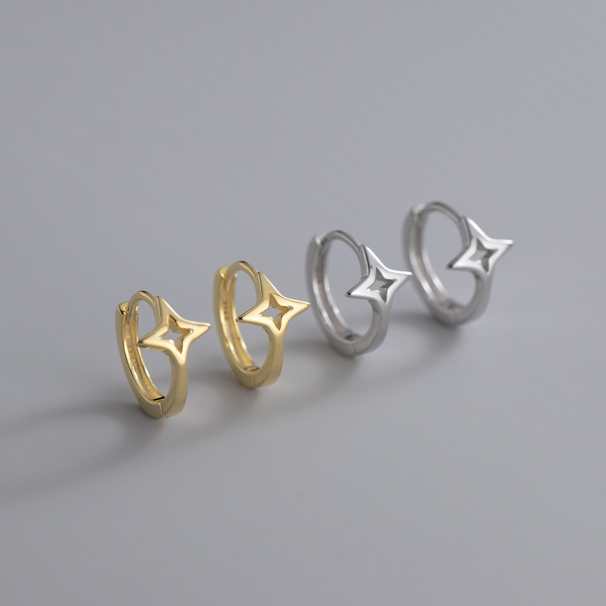 Eloch s925 botón de orejas de plata dulce japonés hueco estrella de cuatro cuadrados personalidad joyería de orejas de moda G9837