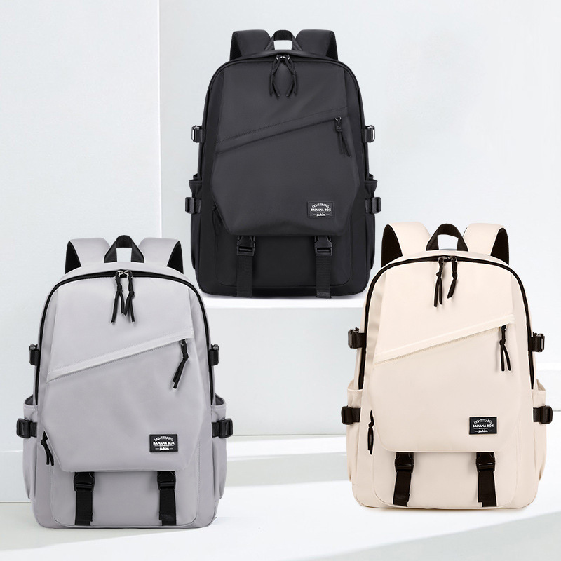 Suministro transfronterizo mochila de viaje al aire libre Junior High School College schoolbag moda simple ligero Oxford Mochila de tela