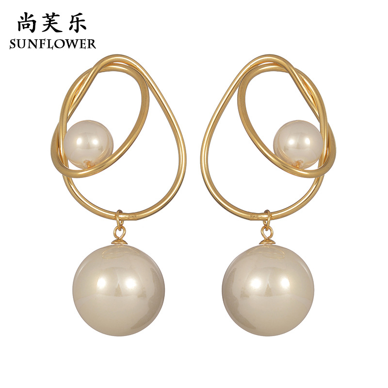 trend fashionable elegant earrings from pearl with tassels
