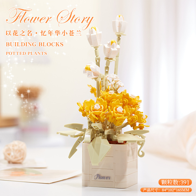 積み木の花がバラのオルゴールを飾っています。|undefined