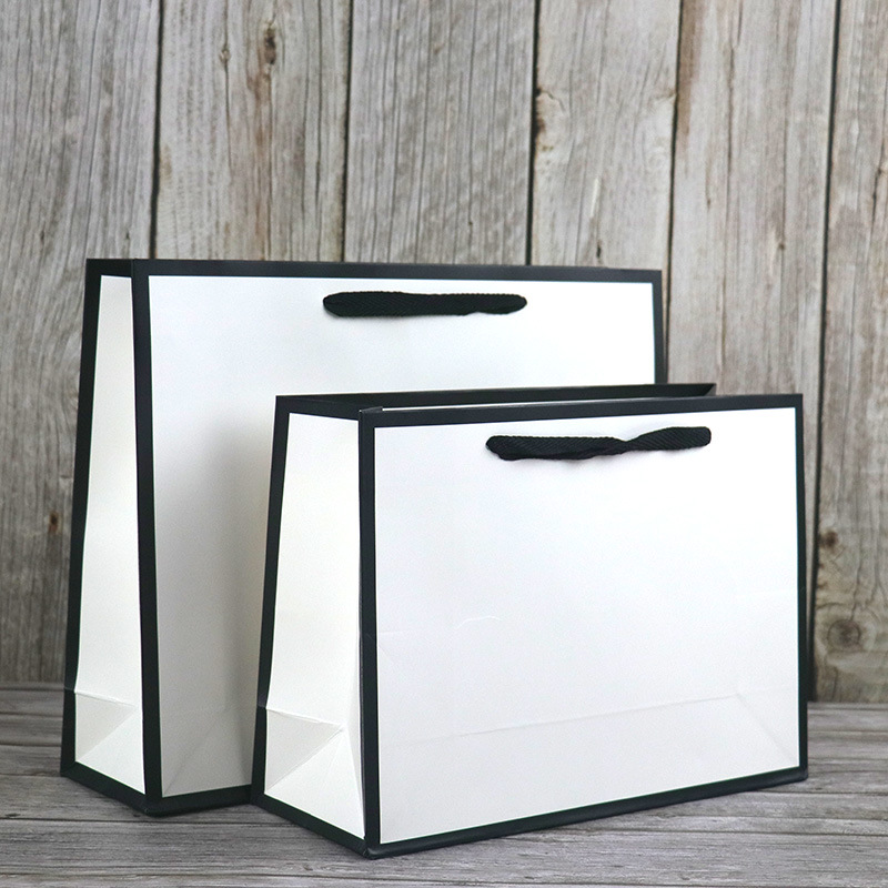 纸袋工厂现货时尚高档服装店送礼手提纸袋广告购物包装好看礼品袋