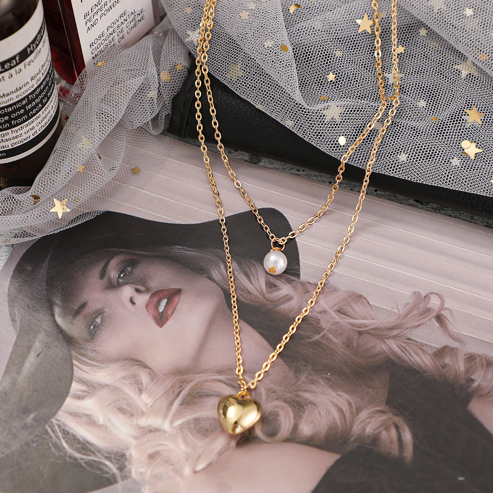 Collier cœur en perles multicouches, style européen et américain, collection 2021 : bijoux féminins simples, rétro et créatifs, inspirés des styles européen et américain._voghion.com