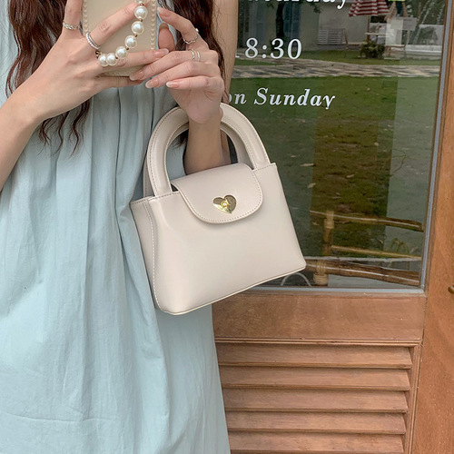 Korean new niche design love lock handbag ins blogger same women's bag one-shoulder cross-slide bag