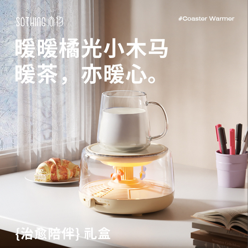 物の恒温にコップを温めて、木の木馬の花茶の保温のコップを敷きます。|undefined