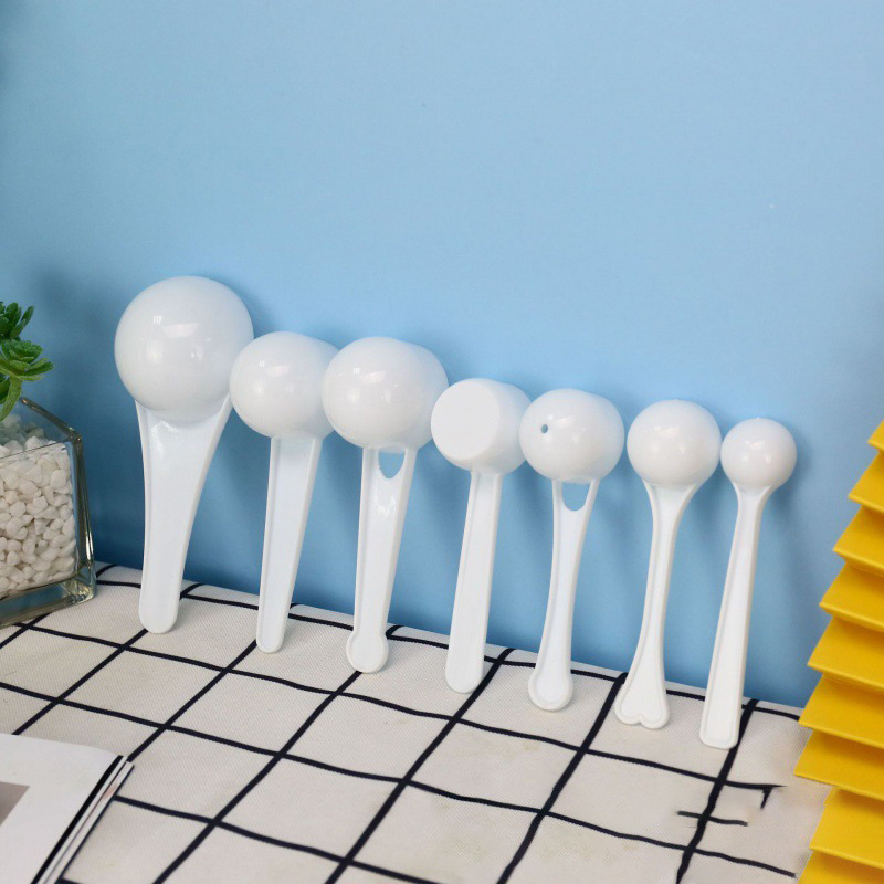 Cuchara pequeña de plástico desechable 1G 3G 5G 10g 15g 50g cuchara de embalaje independiente cuchara cuantitativa de leche en polvo