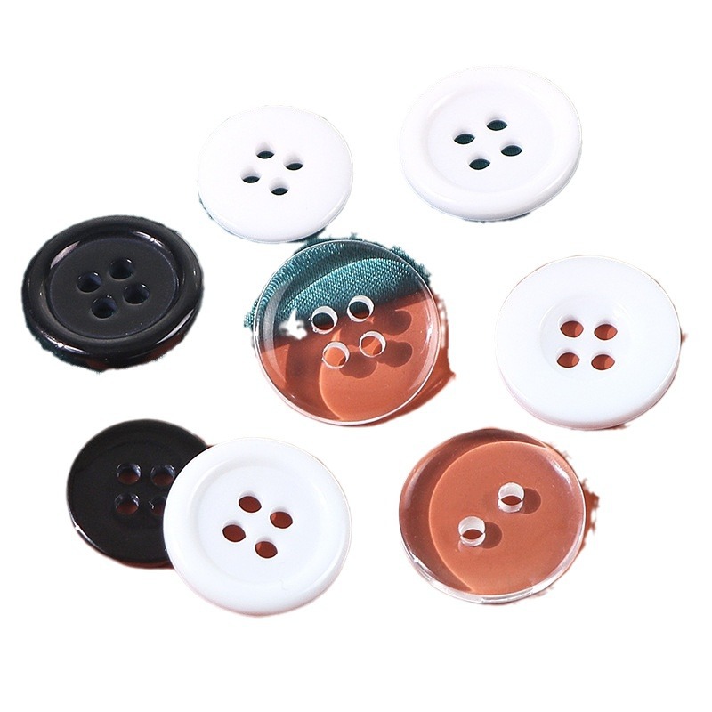Botón de pan de cuatro ojos Camisa blanca y negra Cortavientos Botón de resina Botón de resina de dos ojos Botón de pan de cuatro ojos con borde fino transparente