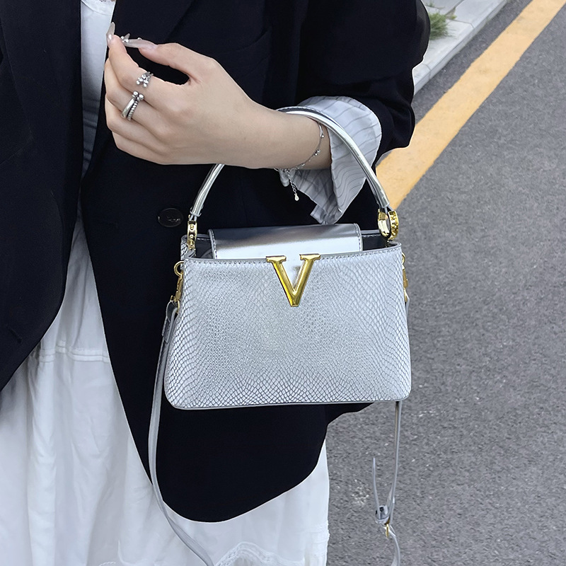 Bolsa de alta calidad de textura 2025 verano nuevo estilo bolso de hombro con patrón de ondas bolso de mensajero con patrón de serpiente de lentejuelas mujer