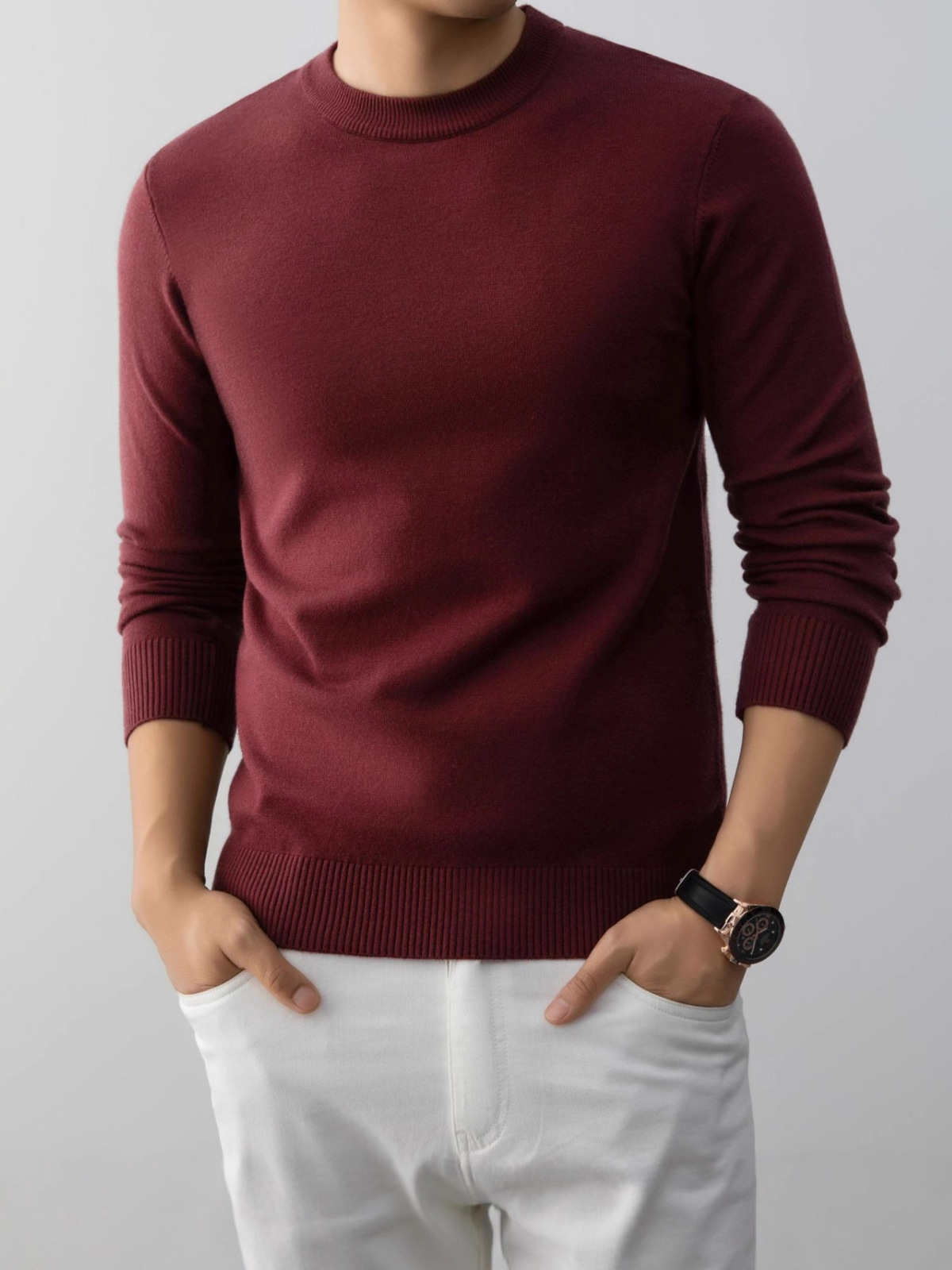 Demi-season solid thin knitted sweater with a round collar
