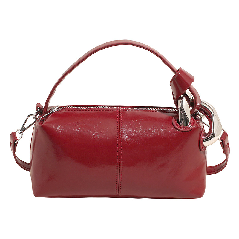 Transfronterizos de alta calidad de tela de cera de aceite bolso de almohada de mano para mujeres 2026 nueva moda lujosa ligera versátil mochila