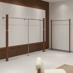 洋服店の上の壁の展示棚の中の古風な婦人服の店は簡単にハンガーを掛けて手の店のステンレスの床式の棚を買います。