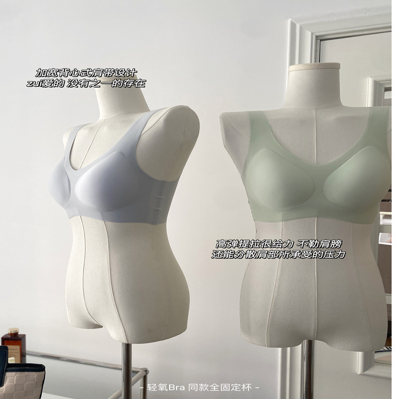 El procesamiento de la fábrica al por mayor pequeño pecho empuja hacia arriba la ropa interior sin costuras de las mujeres completo fijo Delgado inalámbrico deportes belleza espalda sujetador de las mujeres