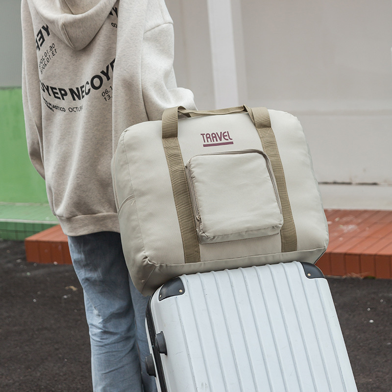 2023 primavera viaje de viaje bolsa de almacenamiento de doble capa impermeable engrosada carro Portátil Bolsa de hombro viaje de larga distancia bolso