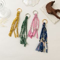 Amazonの売れ筋の新しいカラフルな靴ひもペンダント手織りキーホルダーネット有名人のペンダントカラーロープビーズDIY