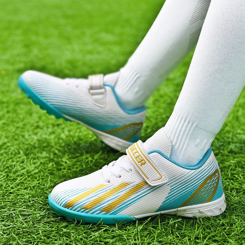 Fábrica directa transfronteriza al aire libre de la escuela primaria y secundaria zapatos de fútbol para niños uñas rotas hombres y mujeres zapatillas Deportivas Zapatos de entrenamiento profesional