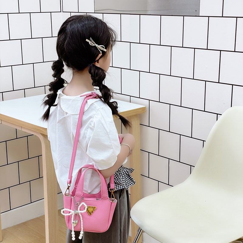 Bolso de canasta de comida portátil para niña lindo bolso de mensajero para niños con lazo de perlas mini bolso para niños de color sólido