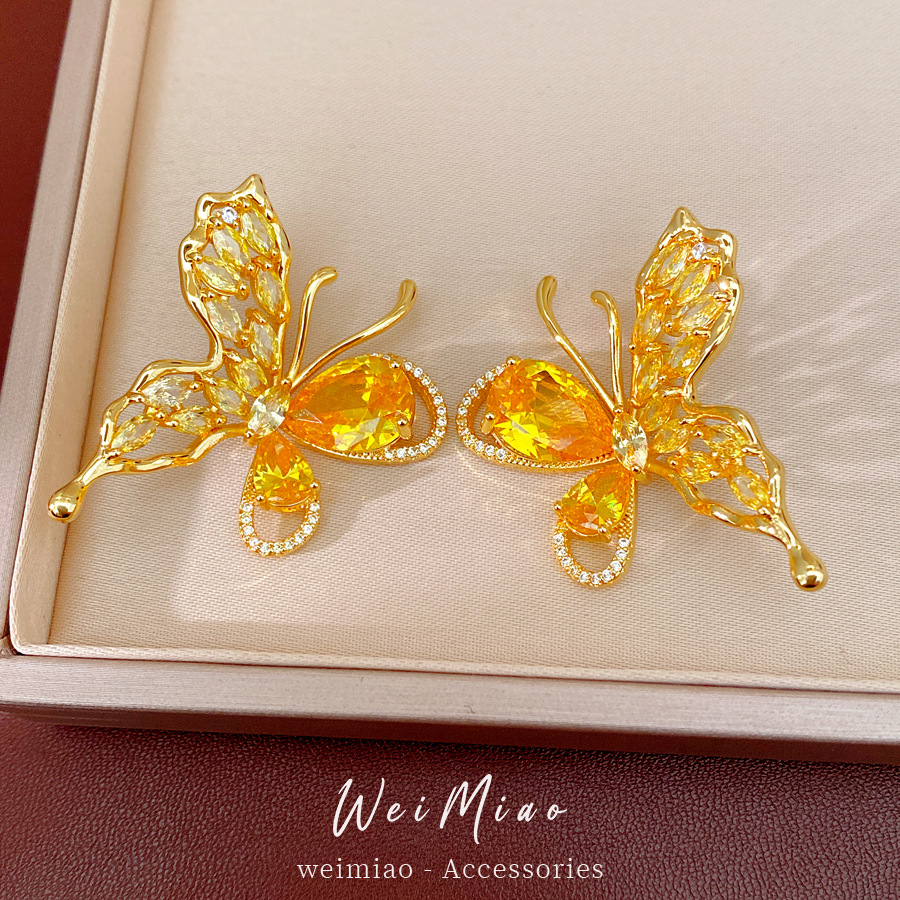 Oro verdadero electron-combustible mariposa de piedra pernos de orejas temperamento exquisito personalidad nicho pendientes ligero lujo conjunto de joyas de alta calidad