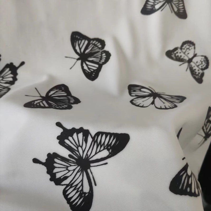 时尚优雅淑女蝴蝶反光布春夏连衣裙幻彩印花布新款设计手提袋面料