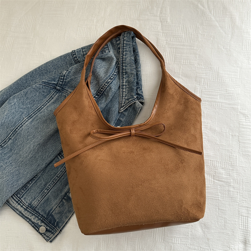 Bolsa de viaje al trabajo para mujeres estilo coreano retro de alta capacidad bolso de brazo 2025 primavera alta sensación bolso de hombro