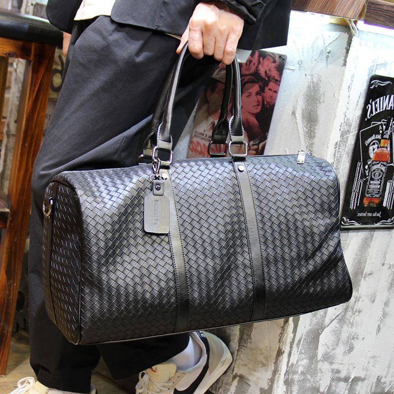 Bolso de mano tejido clásico para hombre con punto transfronterizo, bolso de viaje de negocios de corta distancia, bolso de equipaje de moda de gran capacidad