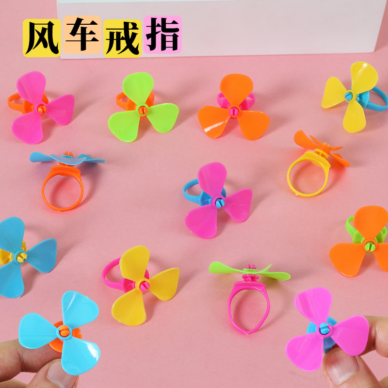 Anillo de molino de viento para niños Anillo de tesoro princesa lindas joyas de niña dibujos animados pequeños anillos de plástico juguetes para niños pequeños