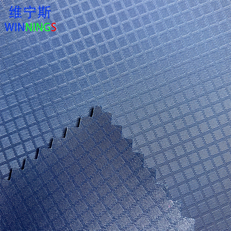 厂家现货供应尼龙格中斜pu蓝色涂层布箱包布料防水