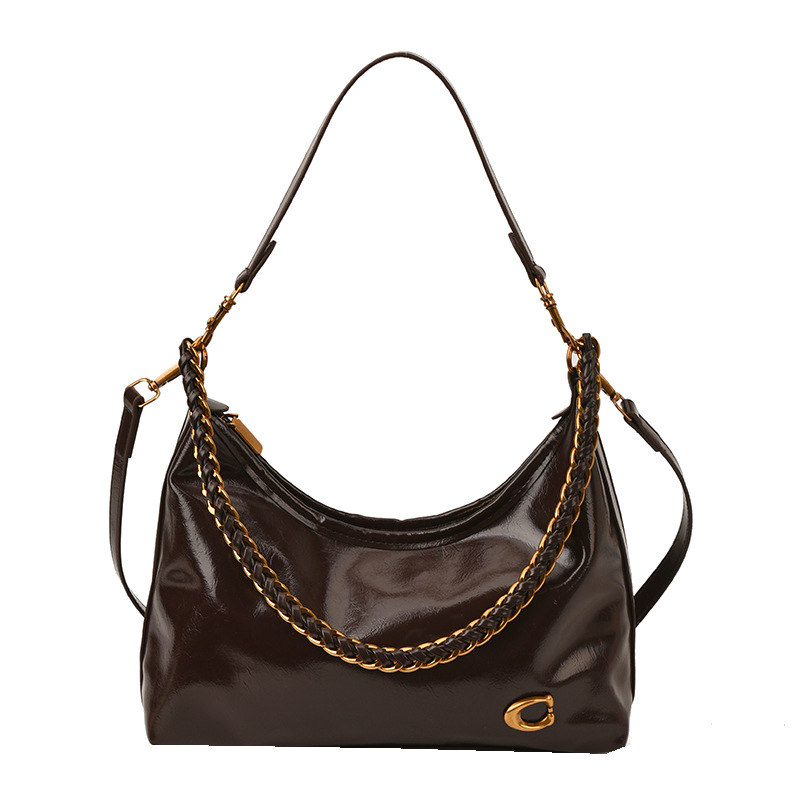 Bolso de alta sensación de mujer 2025 nuevo nicho de cadena brazaleta bolso súper caliente universal bolso de hombro