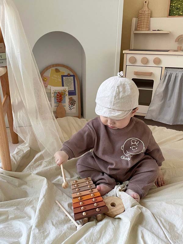 Vêtements pour enfants coréens bébé trésor automne nouveau graffiti dessin animé tête humaine pull pantalon ensemble deux pièces_voghion.com