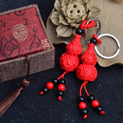 Wholesale of small gifts such as vermilion entry and exit Ping An gourd car keychain sandstone Pixiu key chain under one yuan