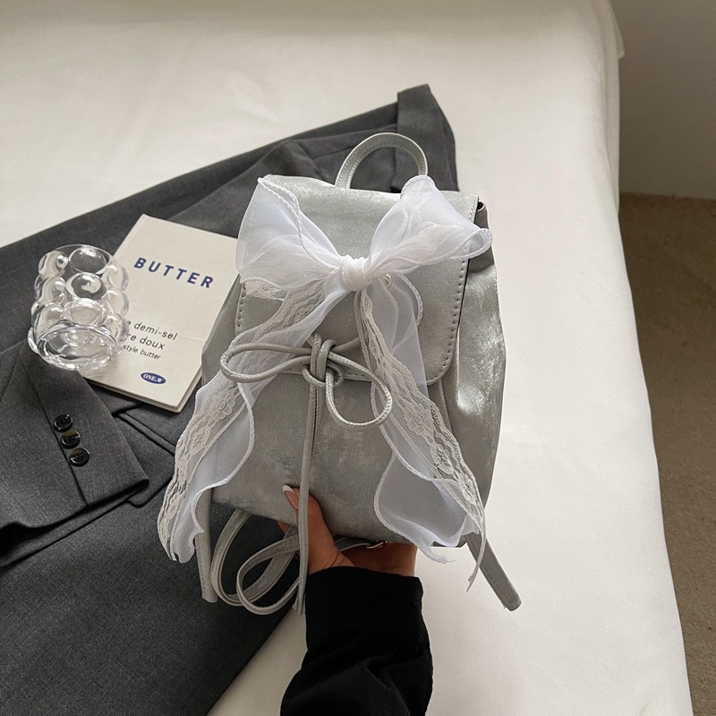 Gran capacidad coreana encantadora mochila de moda de ballet para mujeres 2024 nuevo bolso de cubo de arco de verano