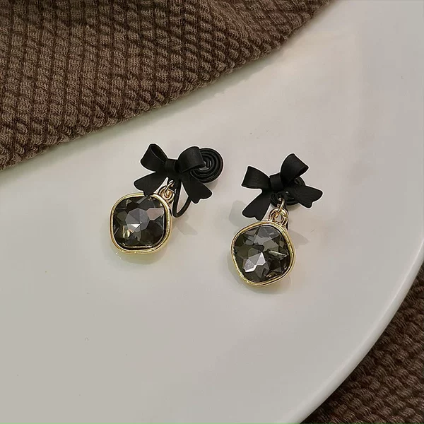Mosquito coil with bow, ear clips