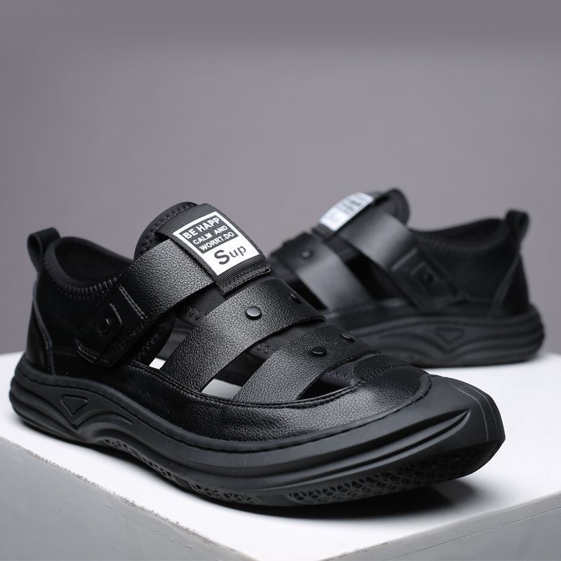 Comercio exterior verano hombres casuales Baotou sandalias fábrica de PU al por mayor zapatos de playa perforados transpirables zapatos con agujeros hombres