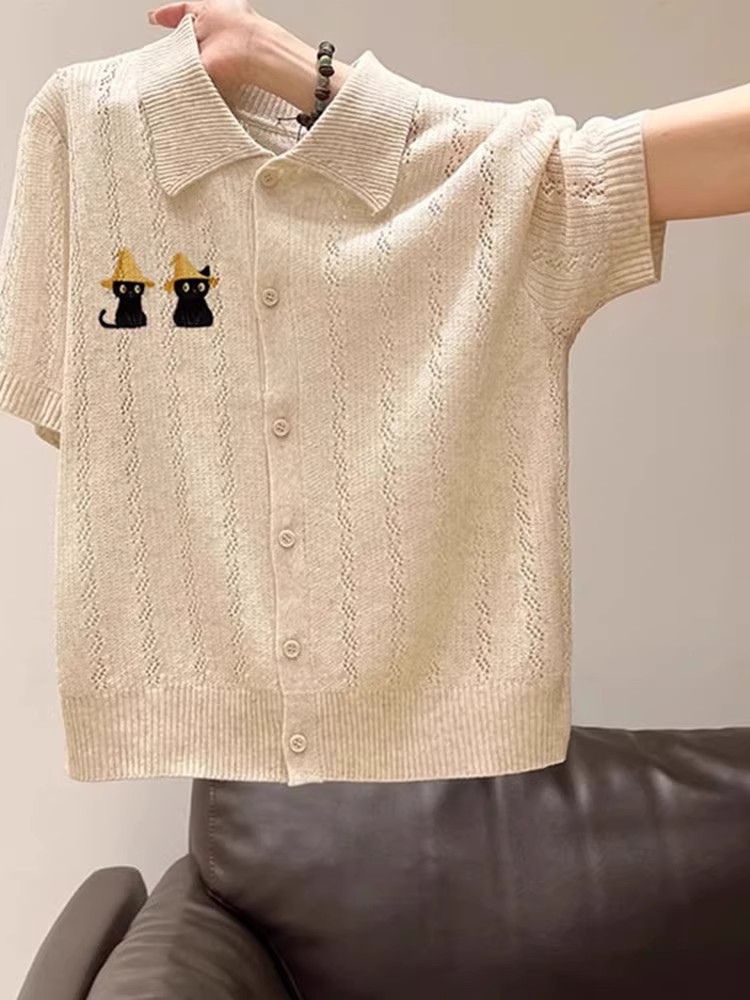 Áo polo nữ tay ngắn cổ bẻ thêu họa tiết form rộng — Màu yến mạch