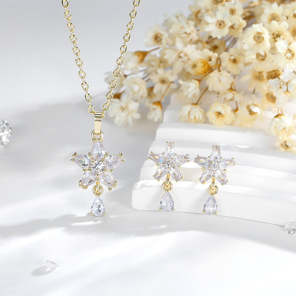 Diseño de moda transfronteriza flor colgante de gota de agua conjunto de joyas pendientes de cobre chapado en oro collar joyas de plata al por mayor image 3